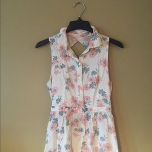 Love this dress. Worn many times. 2 slight stains